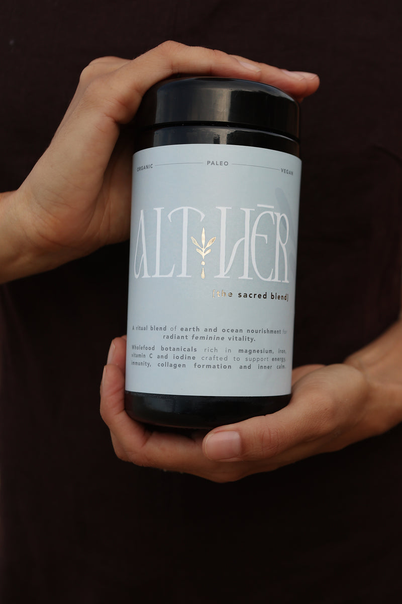 Hands holding jar